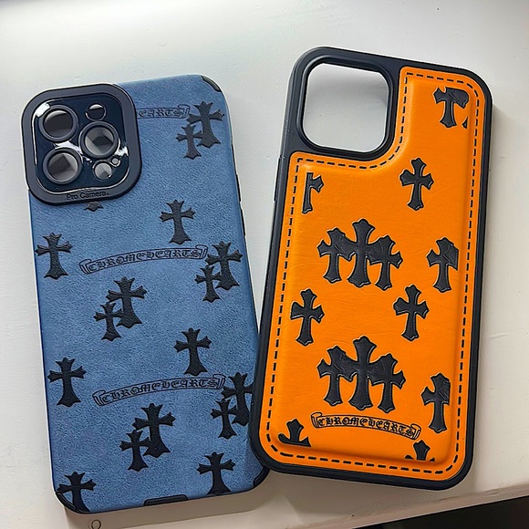 A set of 2 chrome heart iPhone 12 Pro Max phone cases.